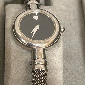 Movado 
Bareleto Ladies Watch 
Excellent Used Condition